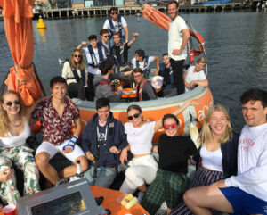 Guests aboard a round orange Aquadonut boat in Melbourne Docklands